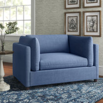 Blue chair and a deals half with ottoman